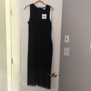 Black V neck dress with fringe